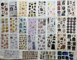Secondary image for the Stack of sticker sheets of all sorts (brand new) Auction Item