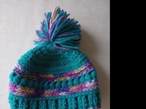 Primary image for the Item #13 Childs Size Bead Stitch Multi-Color Teal With Yarn Tassel Hat Auction Item