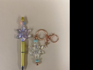 Primary image for the Snowflake Pen and Keychain Bundle Auction Item
