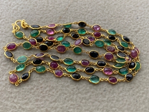 Secondary image for the  Gold and Semi-Precious jewel cut stone long necklace Auction Item