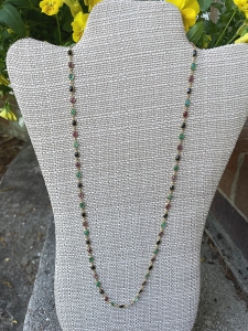 Secondary image for the  Gold and Semi-Precious jewel cut stone long necklace Auction Item
