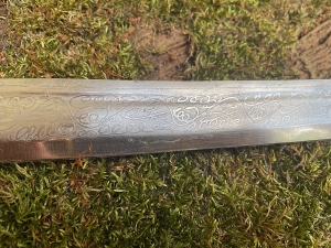 Secondary image for the Vintage India Sword with engraving and velvet scabbard Auction Item