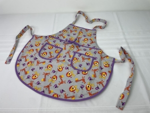 Primary image for the Children’s apron - lions/giraffes/toucans Auction Item