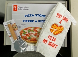 Primary image for the 150 - Pizza Stone, Cutter and Pack of 2 Kitchen Towels Auction Item