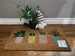 Primary image for the 208 - Door Mat, Gnome and Plant in Watering Can Pot Auction Item