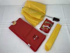 Primary image for the M&M red scarf, yellow M&M umbrella, Skittles Auction Item