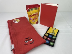 Primary image for the M&M red scarf, M&M socks, red lined journal, Starburst Auction Item