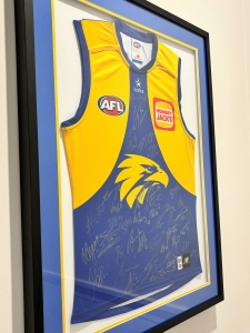 Secondary image for the Signed West Coast Eagles – 2025 Jumper Auction Item