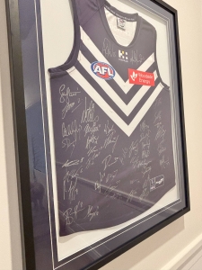 Secondary image for the Signed Fremantle Dockers – 2025 Jumpers Auction Item