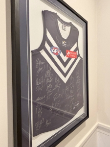 Secondary image for the Signed Fremantle Dockers – 2025 Jumpers Auction Item