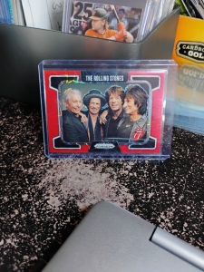 Secondary image for the 2025 Rolling Stones Prizm #58, The Rolling Stones Red Laser Parallel  Auction Item