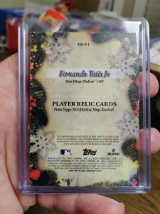Secondary image for the 2025 Topps Holiday Player Relic Card #PR-FT, Fernando Tatis Jr /10 Auction Item