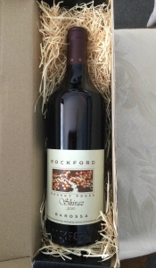 Primary image for the BOTTLE OF HIGH QUALITY RED WINE - ROCKFORD BASKET PRESS SHIRAZ 2010 Auction Item